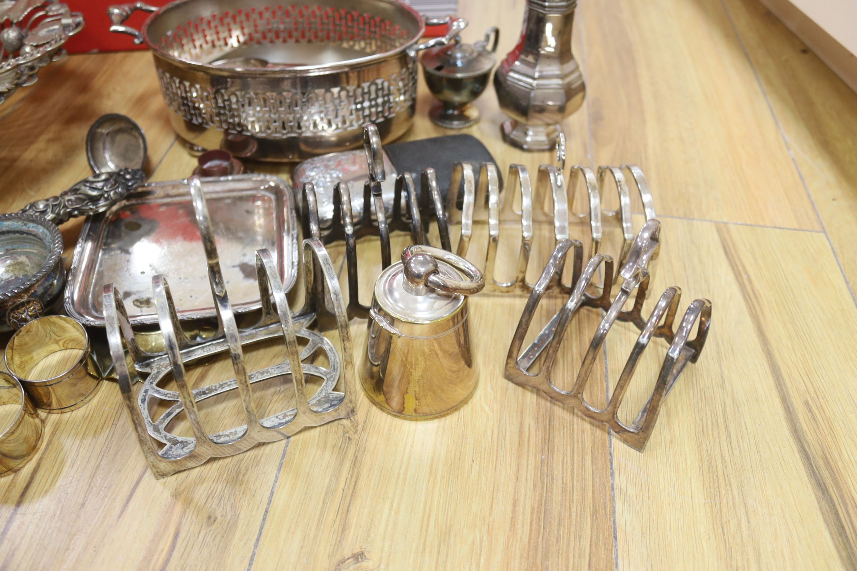 Mixed plated wares including wirework fruit basket, salts, toastracks, caster, etc.